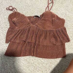 South moon under ruffle top | size small